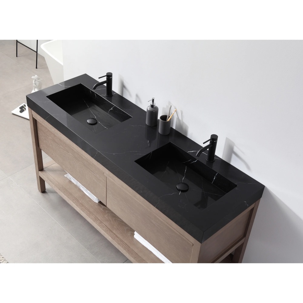 The Bibury 72 Inch Double Bathroom Vanity with Top features a black marble countertop with two rectangular sinks, black faucets, and wooden cabinetry. The countertop holds a soap dispenser, two toothbrush holders, and a cup.
