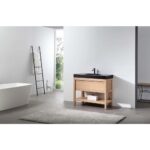 Minimalist bathroom with a Bibury 36 Inch Bathroom Vanity with Top, freestanding white tub, black sink, ladder towel rack, gray rug, and large windows filling the space with natural light.