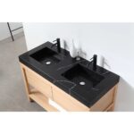 The Bibury 48 Inch Double Bathroom Vanity with Top features a black marble countertop, black faucets, and a light wood base, set against a white wall for a sleek modern look.