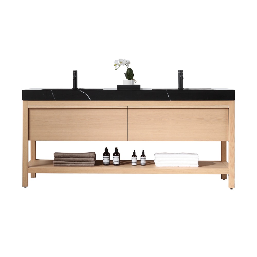 The Bibury 72 Inch Double Bathroom Vanity with Top features a modern wooden design, black countertop, double sinks, two drawers, and an open shelf showcasing folded towels, bottles, and a small potted plant with white flowers.