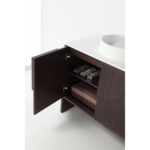 The Celle 36 Inch Bathroom Vanity With Vessel Sink features a dark wood finish, one door opening to reveal two shelves for toiletries and towels, and is completed by a white countertop with a round vessel sink on top.