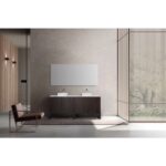 Minimalist bathroom with a Celle 72 Inch Double Bathroom Vanity With Vessel Sinks, large rectangular mirror, and brown armchair. Natural light streams through vertical wooden slats, highlighting the neutral-toned modern space.