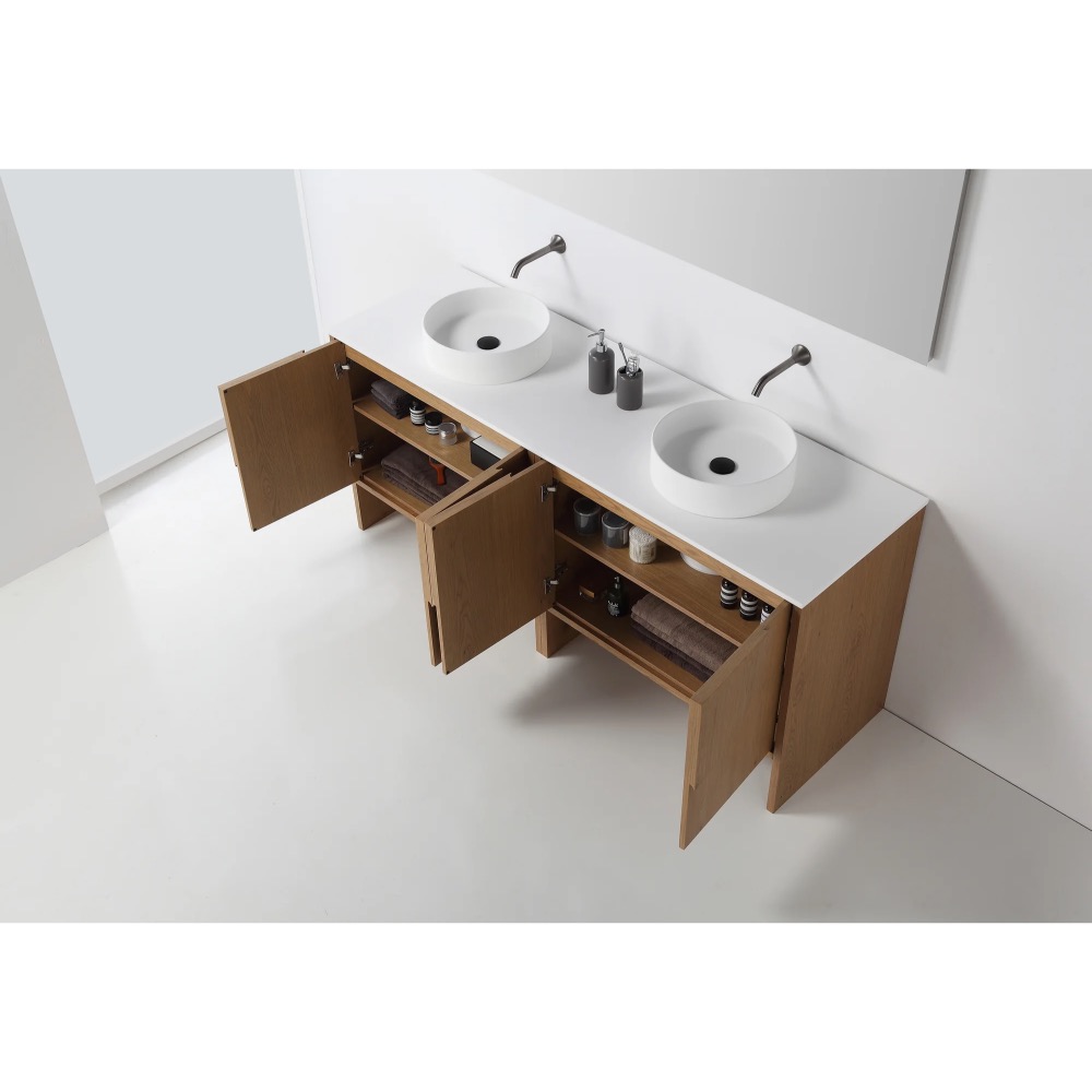 The Celle 72 Inch Double Bathroom Vanity With Vessel Sinks features wooden cabinets, a white countertop, round vessel sinks, wall-mounted faucets, storage shelves, and open cabinet doors showing organized bathroom items inside.