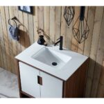 The Lyon 30 Inch Bathroom Vanity with Top includes a white sink, black faucet, and white countertop, complemented by a wooden plank wall, metal ring with dark hand towel, and black geometric pendant lights above.