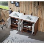 A modern bathroom features the Lyon 60 Inch Double Bathroom Vanity with Top, a white countertop, open cabinet doors showing towels and toiletries, wood panel walls, pendant lights, and a large window overlooking greenery.