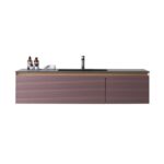 The Oslo 60 Inch Wall Mount Single Bathroom Vanity features a ribbed mauve front, black countertop, and built-in sink. Two bottles and a small towel on the left side add style and function to your modern bathroom.