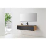 A modern bathroom with an Oslo 60 Inch Wall Mount Single Bathroom Vanity featuring black drawers, a wood frame, a rectangular sink with a black faucet, a large mirror above, and a tall green plant in the corner.