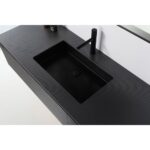 A modern Oslo 60 Inch Wall Mount Single Bathroom Vanity with a rectangular black sink, matte black faucet, and textured black countertop is shown from above. A partial mirror and a small decorative item are also visible.