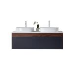The Ronda 55 Inch Wall Mount Vanity with Double Vessel Sinks boasts a modern design, dark wood and navy cabinet, two white vessel sinks, and a small potted orchid set between them.