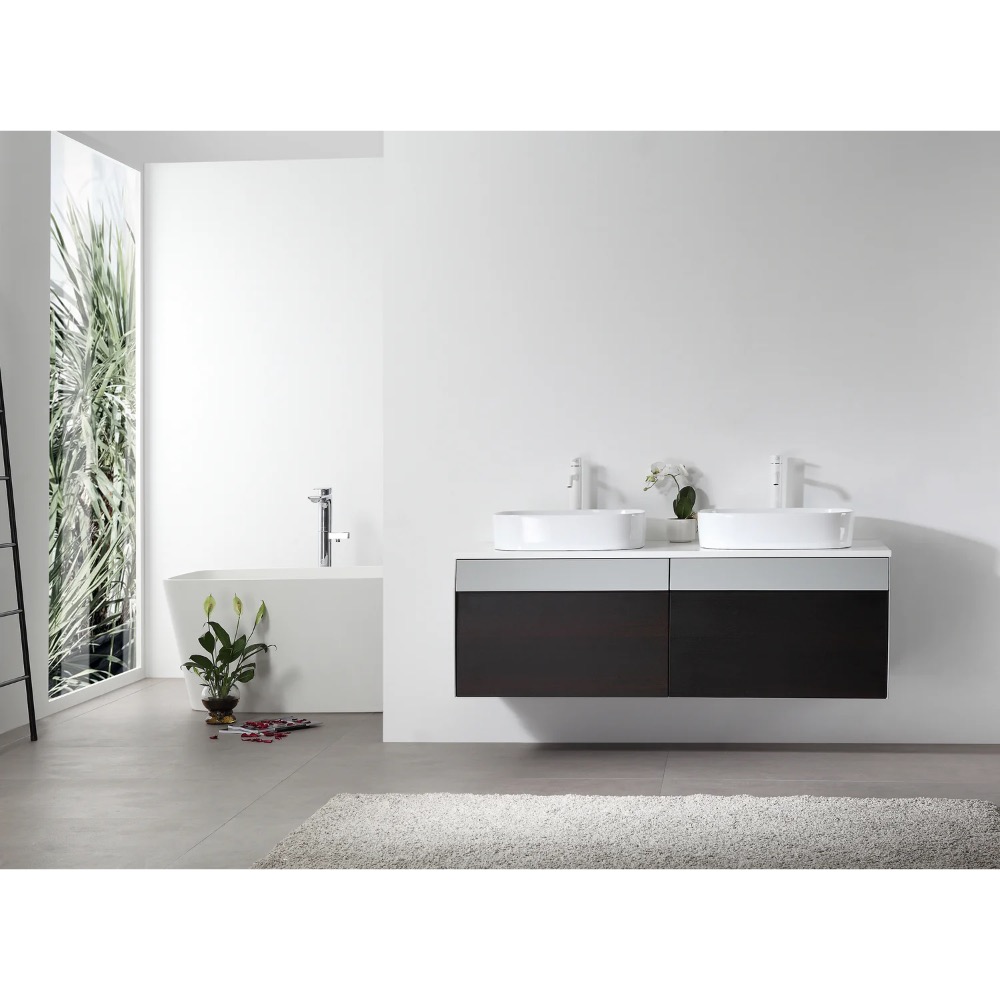 Modern minimalist bathroom featuring the Ronda 55 Inch Wall Mount Vanity with Double Vessel Sinks, a freestanding white tub by a large window, a small plant, and a gray rug on the white floor.