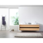 Modern minimalist bathroom featuring the Sintra 72 Inch Wall Mount Vanity with Double Vessel Sinks, a white countertop, gray floors, a shaggy rug, black towel ladder with folded towels, and a window showcasing natural light and greenery.