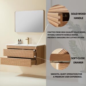 The Linea 36 Inch Wall Mounted Bathroom Vanity is a modern floating vanity with a mirror, featuring two wooden drawers, a solid wood handle, and soft-close drawers for smooth and quiet operation.