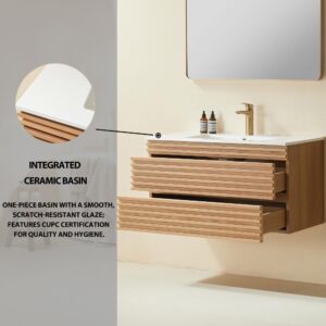A modern bathroom showcases the Linea 36 Inch Wall Mounted Bathroom Vanity with three open drawers, a white integrated ceramic basin, gold faucet, and wall-mounted mirror. The CUPC-certified basin offers a smooth, scratch-resistant surface.