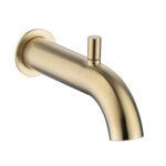 The GeoFlow Round Shower System features a brushed gold wall-mounted bathtub spout with a curved design and a sleek lever diverter on top.