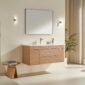Modern bathroom with Linea 48 Inch Wall Mounted Bathroom Vanity, square mirror, gold faucet, wall sconces, wooden stool with books, potted plant by sheer-curtained window, all in a neutral color palette.