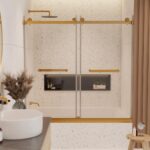 Modern bathroom with terrazzo walls, a Tub Door Double Sliding Frameless enclosure featuring gold hardware, a rainfall showerhead, a recessed shelf with plants, and a round countertop sink in the foreground.