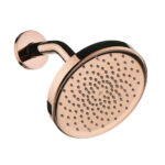 The GeoFlow Round Shower System features a rose gold, round shower head with multiple small nozzles, mounted on a matching curved wall arm.