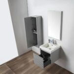 A minimalist bathroom features the Positano 20 inch Wall Mount Vanity With Sink, showcasing an open drawer, rectangular sink, wall-mounted cabinet with open doors revealing toiletries on shelves, and a mirror above.