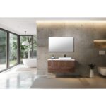 Modern bathroom with large windows, freestanding bathtub, and an Orsa 48 Inch Wall Mount Bathroom Vanity With Vessel Sink. Concrete walls, neutral tones, and a rectangular mirror complete the space with serene views of greenery outside.