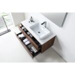 The Orsa 48 Inch Wall Mount Bathroom Vanity With Vessel Sink features a rectangular white sink, silver faucet, soap dispenser, and two open wood drawers organized with towels, toiletries, and other bathroom essentials.