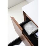 A partially open wooden drawer from the Orsa 48 Inch Wall Mount Bathroom Vanity With Vessel Sink reveals a neatly folded white towel and a small clear container inside, set against a white countertop and white floor.
