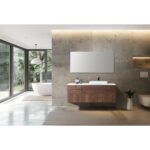 Modern bathroom with minimalist decor features the Orsa 60 Inch Wall Mount Bathroom Vanity With Vessel Sink and a large wall mirror. A freestanding bathtub stands near floor-to-ceiling windows offering views of lush greenery.