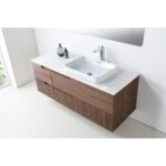 The Orsa 60 Inch Wall Mount Bathroom Vanity With Vessel Sink includes a white countertop, rectangular vessel sink, single-handle faucet, and wood-paneled drawers, all set against a sleek white wall with a round vase and soap dispenser beside the sink.