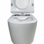 The Dakota Wall Hung Toilet is shown with its lid open, featuring a contoured white ceramic seat and an integrated bidet nozzle at the back of the bowl.