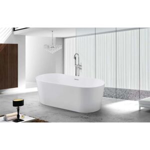 A modern bathroom with the elegant Luma Freestanding Bathtub, a floor-mounted faucet, glass wall, and crystal chandelier. Minimalist light tones and sleek design elements create a luxurious atmosphere.