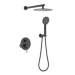 The Halo Pressure Balanced Wall Mount Shower System in matte black includes a round overhead rain shower, a flexible handheld showerhead, and a modern wall-mounted control panel with two knobs.