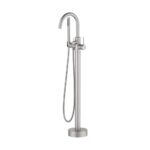 The Halo Floor Mount Tub Filler With Hand Shower in brushed metal has a tall curved spout, a single lever handle, and an attached handheld showerhead with flexible hose.