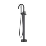 The Halo Floor Mount Tub Filler With Hand Shower is modern with a matte black finish, curved spout, cylindrical base, single lever handle, and an attached handheld shower hose.