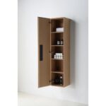 The Cartisan Design Side Cabinet is a wooden, wall-mounted unit with one door open, revealing four shelves stocked with folded towels, bottles, and small boxes against a plain white wall.