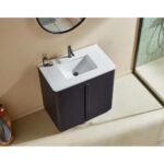The Parma 36 Inch Bathroom Vanity With Top includes a white rectangular sink, black faucet, and dark cabinet, positioned beneath a round mirror on a beige wall. Toiletries are neatly arranged on the vanity surface.