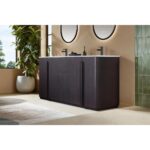 A modern bathroom features the Parma 72 Inch Double Bathroom Vanity With Top in dark wood, two round mirrors, black faucets, green tile accents, a large potted plant, and natural light streaming in from a window.