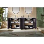 A modern bathroom featuring a Parma 72 Inch Double Bathroom Vanity With Top, dark wood cabinets with open doors showing towels and toiletries, two sinks with oval mirrors, plants, a walk-in shower on the right, light walls, and a patterned rug.
