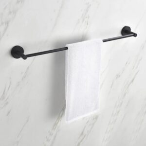 A white hand towel hangs neatly on a black Halo Bathroom Towel Bar, which is mounted on a white marble-patterned wall.