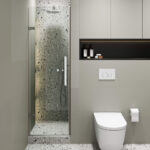 Modern bathroom featuring a terrazzo-tiled walk-in shower with the Nova Hinged Frameless Shower Door, wall-mounted toilet, toilet paper holder, and built-in shelf above the toilet. The minimalist design uses neutral tones.