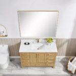 A modern bathroom showcases the Basel 48 Inch Bathroom Vanity with a marble top, rectangular mirror, white sink, gold fixtures, and decor. A toilet sits to the left and sleek grey tile flooring finishes the design.