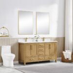 A modern bathroom with a Basel 60 Inch Double Bathroom Vanity, gold faucets, two rectangular mirrors, a white toilet, a plant, basket with towels, and light gray walls with wainscoting.