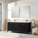 A modern bathroom featuring the Torino 72 Inch Double Sink Bathroom Vanity Cabinet in black, gold fixtures, two gold-framed rectangular mirrors, a marble countertop, light tile flooring, and natural light from a large left window.