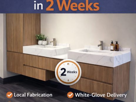 Modern bathroom with two wood and marble vanities, overhead cabinets, and dual sinks. Text promotes custom bathroom vanities ready in 2 weeks, local fabrication, made in USA, and white-glove delivery.